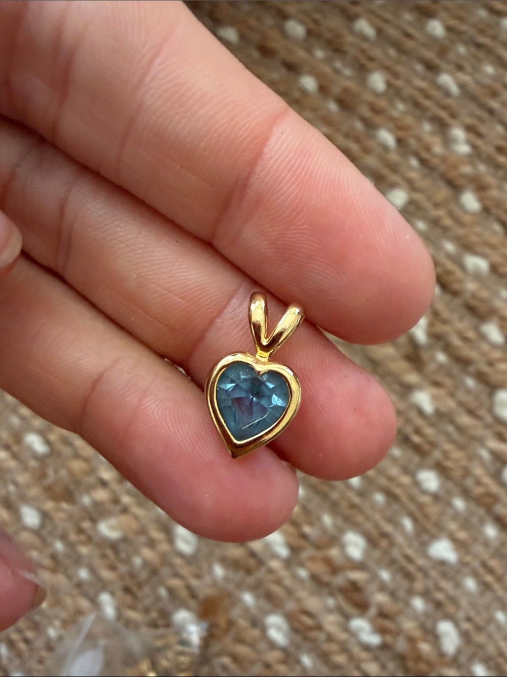 15 Gold Colored heart charm with Blue Stone